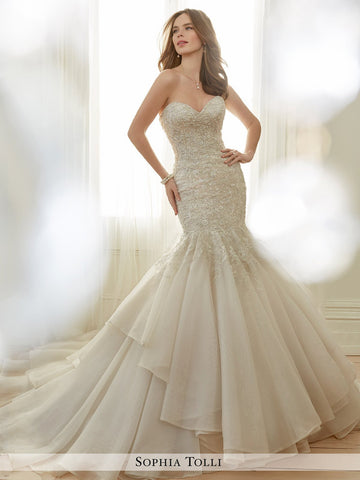 Sophia Tolli strapless fantasy organza trumpe features a sweetheart neckline wedding gown